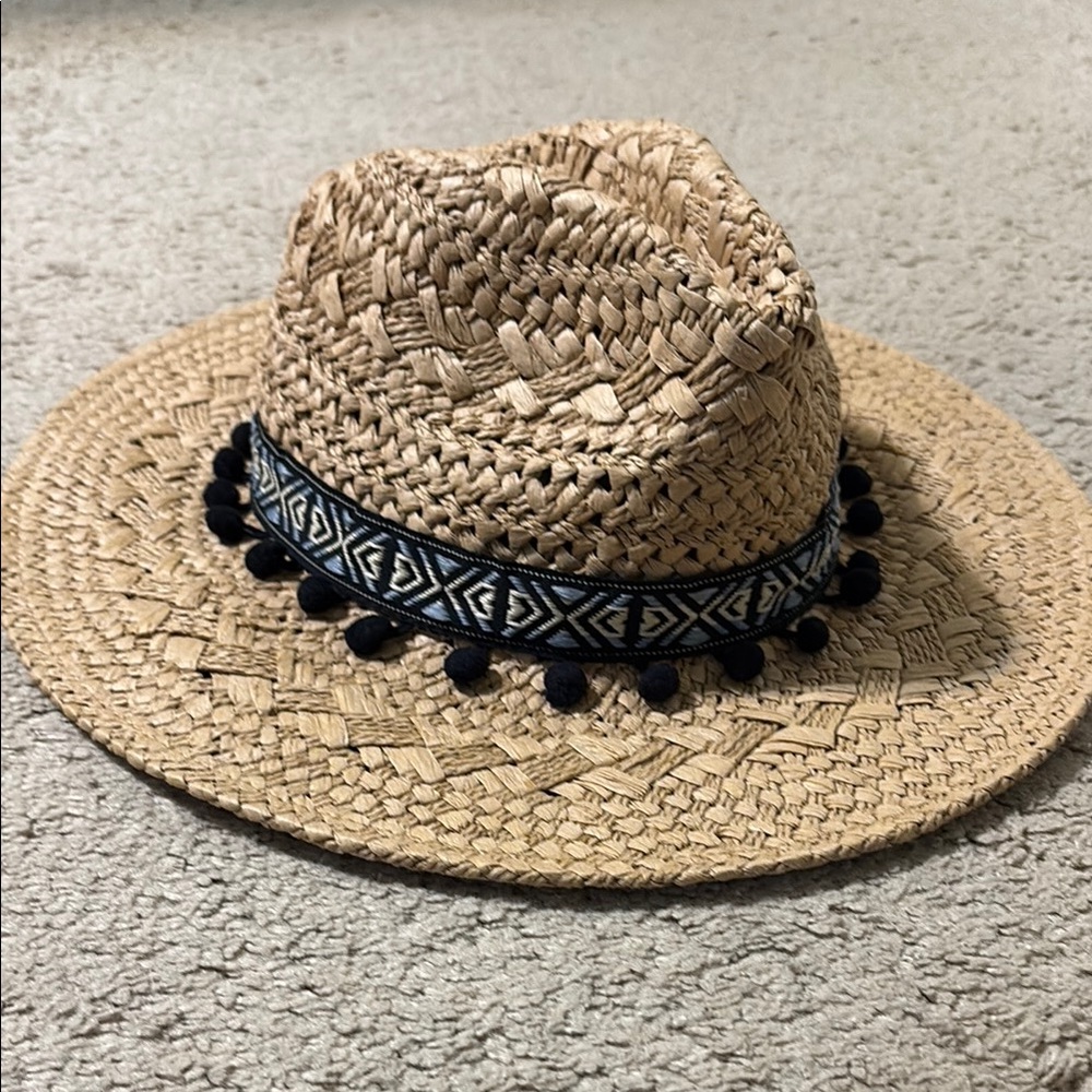 Stylish Straw Hat with Black Pom Pom Trim